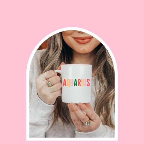 Aquarius 11 ounce multi-color text mug