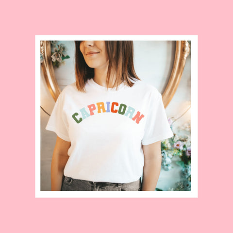 Capricorn pastel text varsity shirt